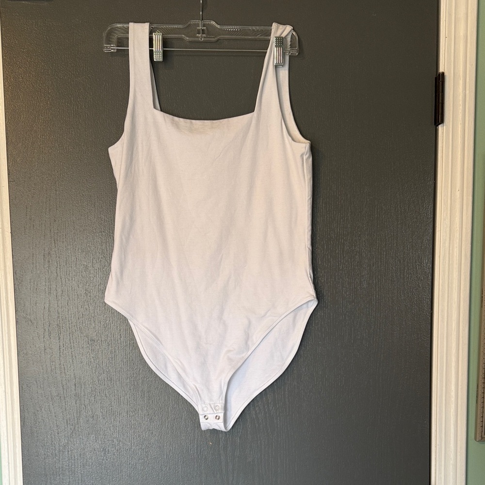 Women’s White One-Piece Bodysuit